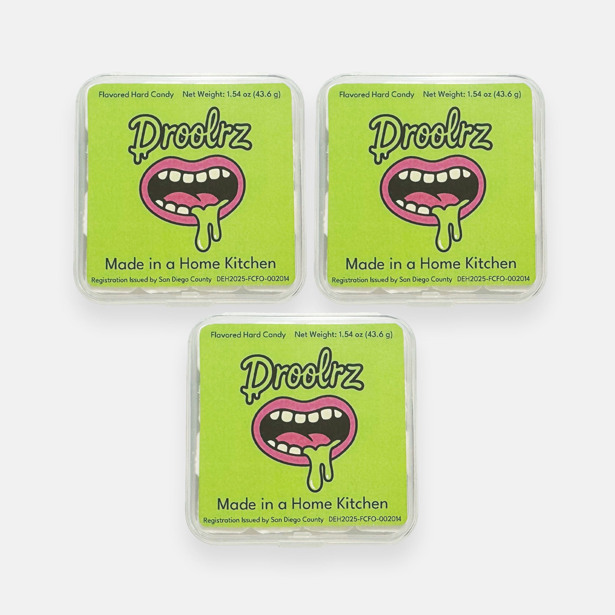 Three packs of Droolrz candy on a plain grey background